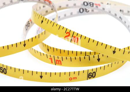 Industrial measuring tape surveying isolated on a white backgroundã€€ Stock Photo