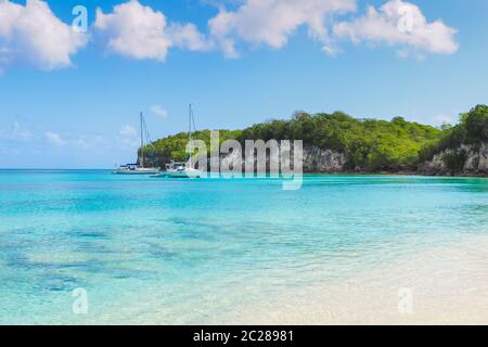 2 yachts moored in Marie Galante tropical sea, Guadeloupe luxury tourism Stock Photo