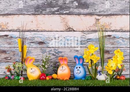 The colorful easter bunnies in the meadow Stock Photo