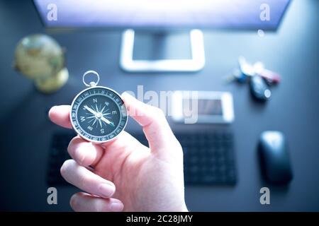 Web business: compass in the foreground Stock Photo