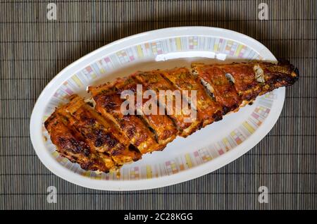 Baked cod on the plate Stock Photo