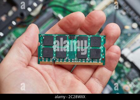 Installing memory module in a laptop computer