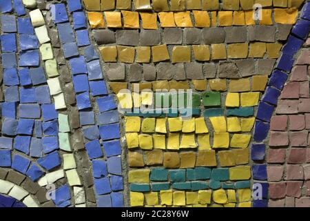 Mosaic pattern of multicolored tiles on the wall Stock Photo