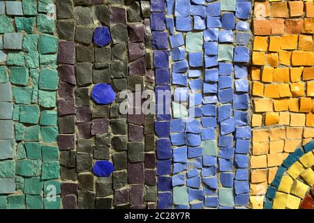 Mosaic pattern of multicolored tiles on the wall Stock Photo