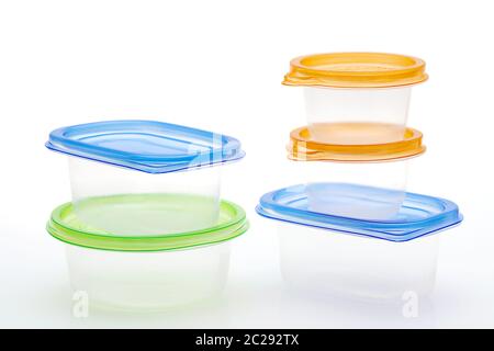 Stack of food plastic containers on white background Stock Photo