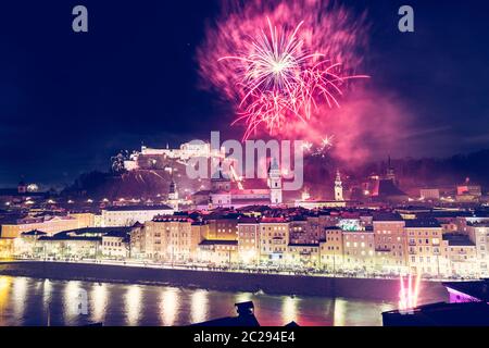 New Year’s Eve: Magical firework over the old city of Salzburg Stock Photo