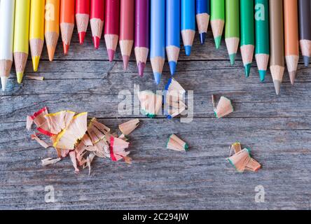 Creativity: Multi-colored pencils on rustic wooden table Stock Photo