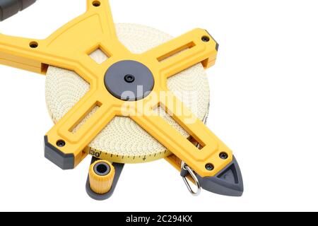 Industrial measuring tape surveying on a white backgroundã€€ Stock Photo