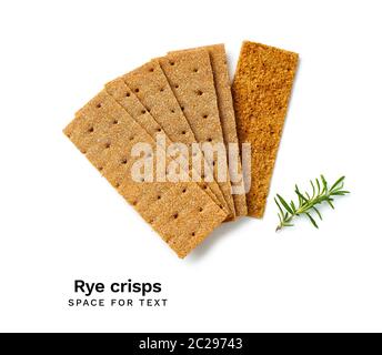 A pile of rye crisps isolated on white background. Top view with copy space. Dietary rye breadcrisps. Stock Photo