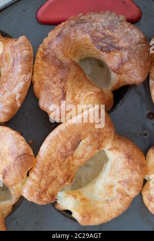 A fresh batch of traditional baked Yorkshire puddings for a Sunday roast lunch in England Stock Photo