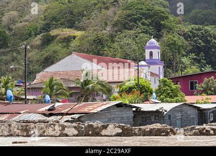 Houses in Portobelo with the church San Felipe Panama Stock Photo