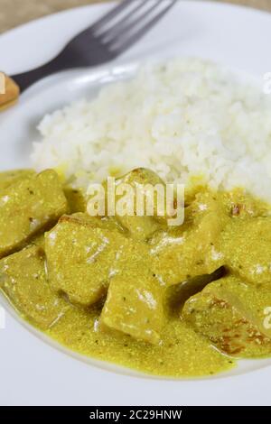 chicken cooked in curry and coconut milk Stock Photo