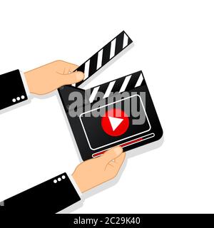 Flat movie clapperboard symbol in human hands. Film icon. Cinematography concept. Vector on isolated background. Eps 10 Stock Vector