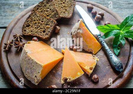 Mimolette with hazelnuts Stock Photo