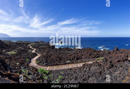 El Hierro, Canary Islands - Hiking trail on the coast of the El Golfo Valley between Las Puntas and Charco Azul Stock Photo