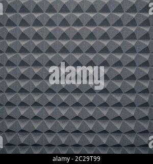 Soundproofing foam rubber texture with convex triangles in studio Stock Photo