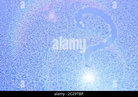 Question mark. The inscription on a wet metal surface. Stock Photo