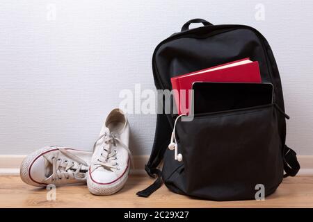 Sports bag with sports equipment. Sportswear and running shoes Stock Photo