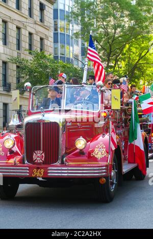 A classic mack fire truck in New York on Columbus Day. Stock Photo