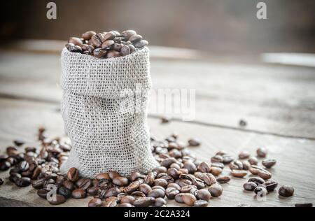 Coffee beans in the sackcloth bag Stock Photo