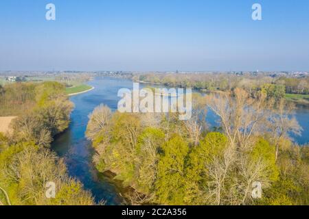 France, Loiret, Loire Valley listed as World Heritage by UNESCO, Mareau aux Pres, confluence of the Loire River and the Loiret River (aerial view) // Stock Photo