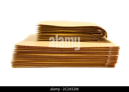 Stack of padded mailing envelopes isolated against a white background Stock Photo