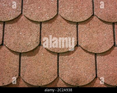 Close up with brick red roof tiles. roof seamless pattern Stock Photo