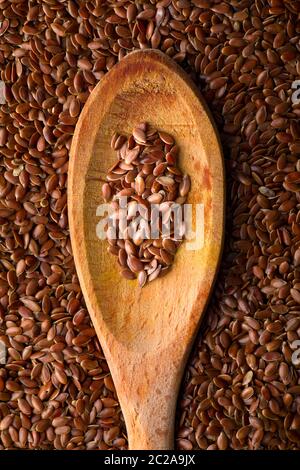 Close-Up of Flaxseed on Wooden Spoon Stock Photo
