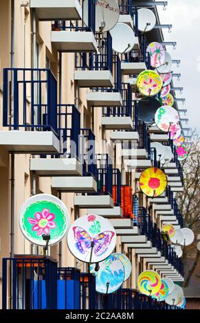 Many satellite TV receiver dishes on an apartment building in Amsterdam, the Netherlands Stock Photo