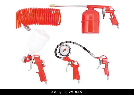 Tire inflator, air hose, spray gun, blow gun, sandblasting gun isolated on white background. Pneumatic tool set. Stock Photo