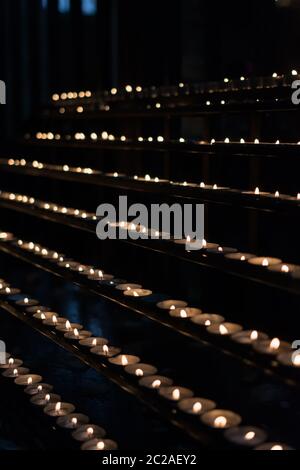 many victim candles in a church Stock Photo