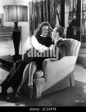 BETTE DAVIS and PAUL HENRIED in DECEPTION 1946 director IRVING RAPPER music Erich Wolfgang Korngold Warner Bros. Stock Photo