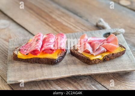 Spanish sandwiches with salchichon anb jamon close-up Stock Photo