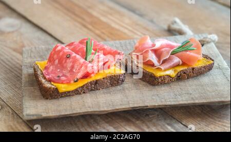 Spanish sandwiches with salchichon anb jamon close-up Stock Photo