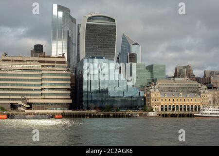 Sun reflections in 22 Bishopsgate The Twentytwo building glass facade onto River Thames as interesting unusual cityscape London City view as of 2020 Stock Photo