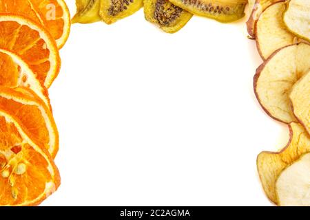 dried oranges,bananas and apples on white isolated background Stock Photo