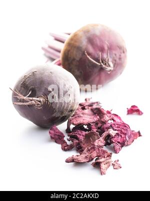 Tasty raw beetroot and dried beetroot. Healthy vegetable isolated on white background. Stock Photo