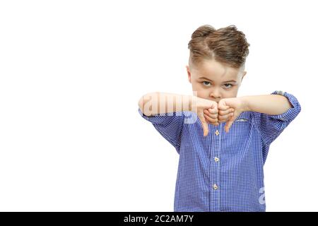 Portrait of stylish handsome boy isolated on white background. Boy showing thumbs down Stock Photo