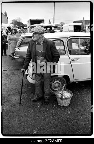 Saint-Aout Market day. Saint-Août is a commune in the Indre department in central France. 1988 Market traders and customers in this rural market town. Stock Photo
