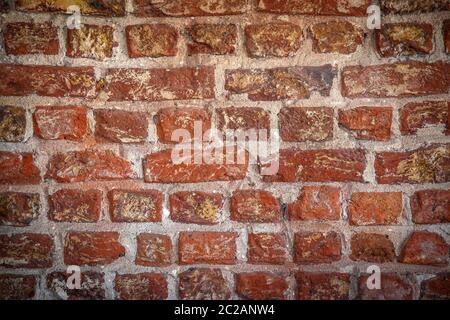 red brick wall texture grunge background with vignetted corners, may use to interior design Stock Photo