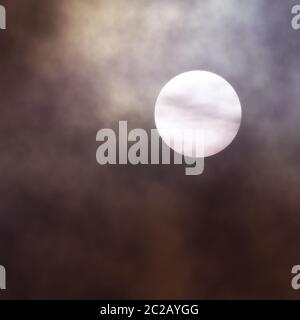 pale moon clouds background Stock Photo