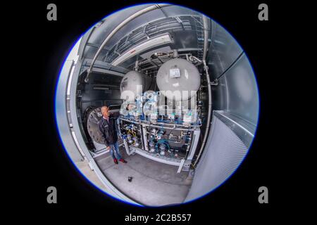 Laage, Germany. 12th June, 2020. The electrolysis plant in the largest grid-connected hydrogen power plant in Europe, according to the company, in the company Apex Energy. Starting this autumn, Apex will supply green energy for industry and commerce, housing companies, public transport or for the intermediate storage of control energy. In this way, up to 300 tons of hydrogen can be produced annually from exclusively renewable energy sources. Credit: Jens Büttner/dpa-Zentralbild/ZB/dpa/Alamy Live News Stock Photo