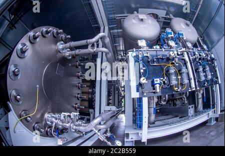 Laage, Germany. 12th June, 2020. The electrolysis plant in the largest grid-connected hydrogen power plant in Europe, according to the company, in the company Apex Energy. Starting this autumn, Apex will supply green energy for industry and commerce, housing companies, public transport or for the intermediate storage of control energy. In this way, up to 300 tons of hydrogen can be produced annually from exclusively renewable energy sources. Credit: Jens Büttner/dpa-Zentralbild/ZB/dpa/Alamy Live News Stock Photo