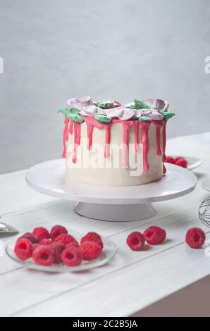 Sweet party decorated cake with raspberry for wedding Stock Photo