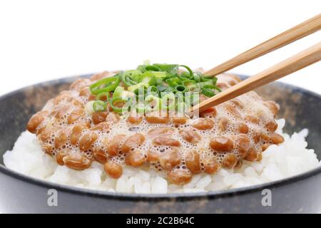 Japanes food, cooked white rice with natto on white background Stock Photo