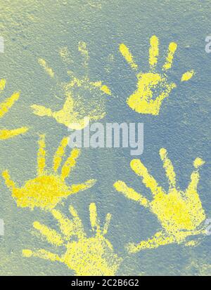 Color background of children's handprints. Multi colored hand prints. Stock Photo