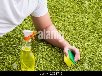 Young husband man cleaning floor at home Stock Photo