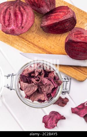 Tasty raw beetroot. Dried beetroot in jar. Top view. Stock Photo