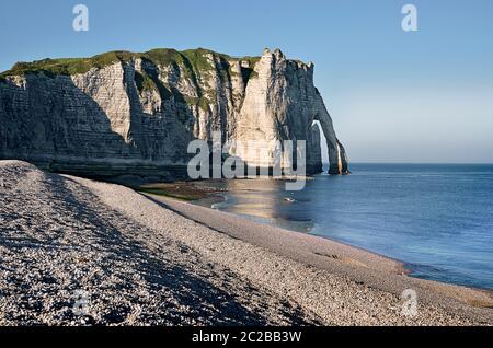 Famous pebble beach and cliff Aval of Etretat, commune in the Seine ...