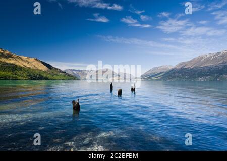 Scenic view of an old jetty in Lake Wakatipu, just off the Queenstown-Glenorchy road. New Zealand.